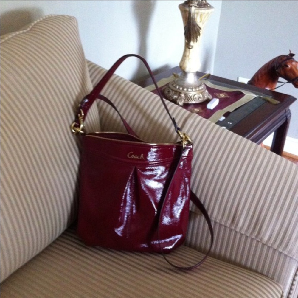 Authentic coach cross body patent deep red color